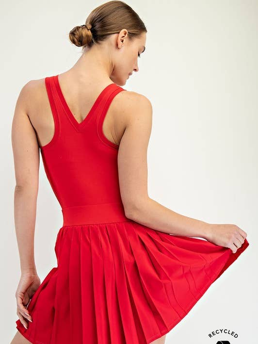 JP065137-SKORTSIE SENZA MANICHE IN PLISSETTATO RICICLATO BUTTER per la vendita all'ingrosso da parte di Sunday Morning