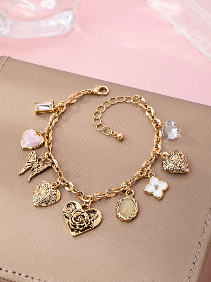 Gold Charm Bracelet with Hearts & Flowers | 80B1652 for wholesale by JOSSLYN by wall to wall