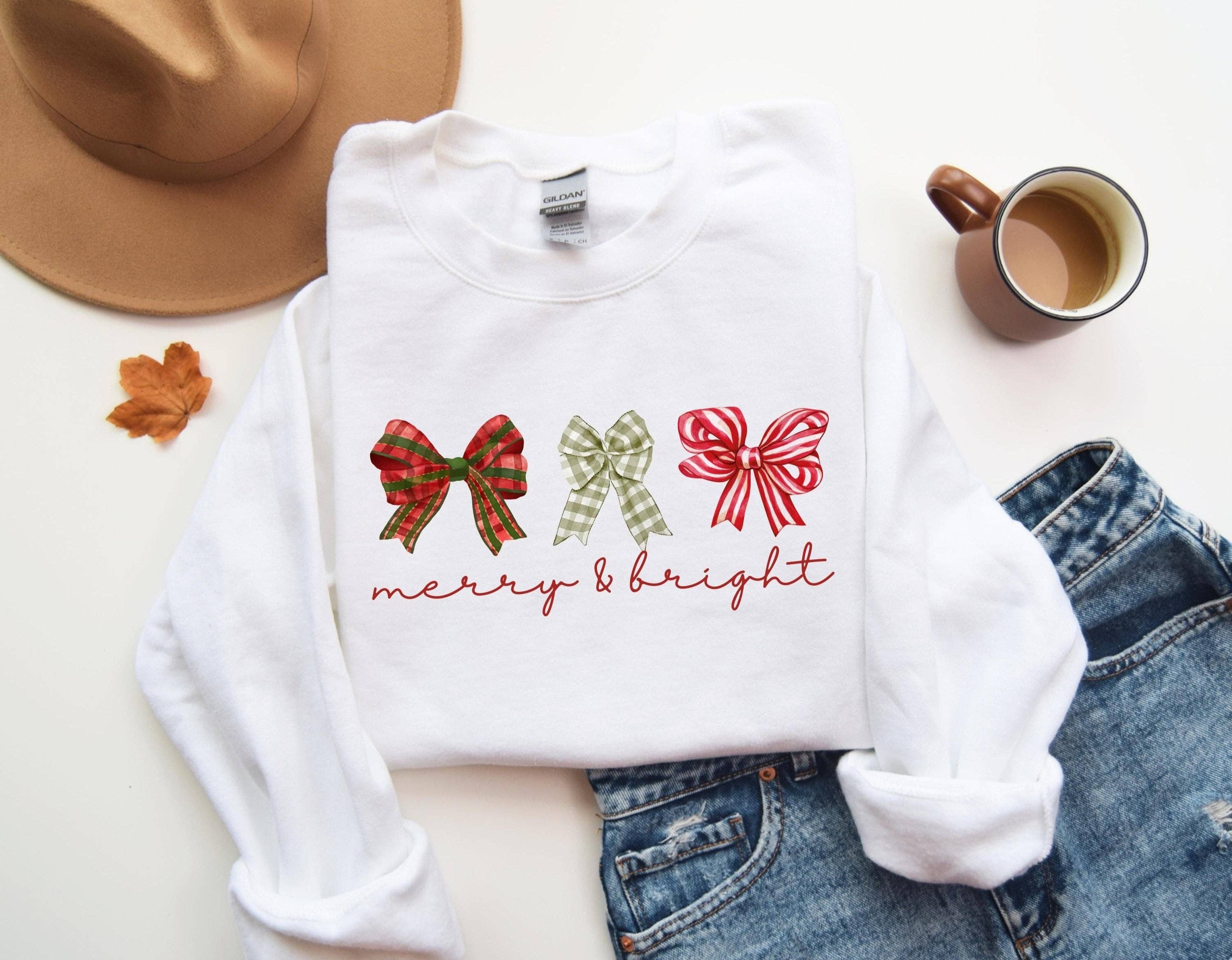 White Merry and Bright Three Bows Sweatshirt for wholesale on Faire6