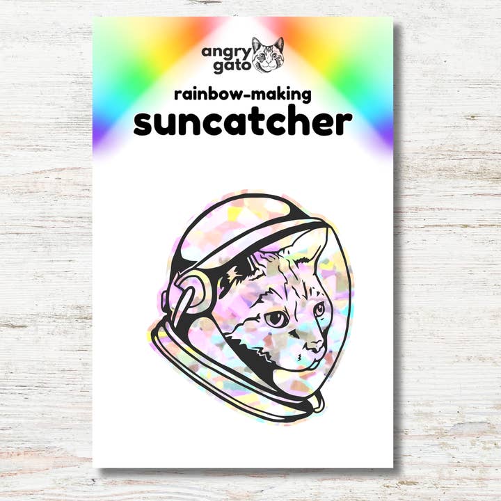 Rainbow-Making Suncatcher Sticker - Space Kitty for wholesale by Angry Gato Designs