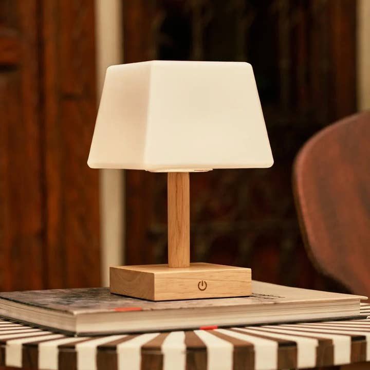 Tommy Light Brown Wooden Table Lamp with Glass - Rechargeable, Dimmable Lamp, Cordless Lighting and other Purchase Wholesale tomillo. Free Returns & Net 60 Terms on Faire trending on Faire.