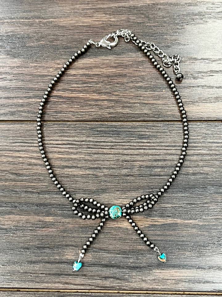 739538, Collier en perles navajo polies de 4 mm fait main pour la vente par ISAC Trading Inc