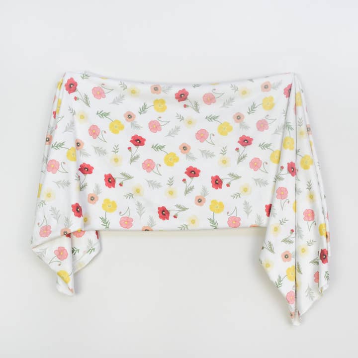 Extra Soft Stretchy Knit Swaddle Blanket: Playful Poppies for wholesale by Village Baby