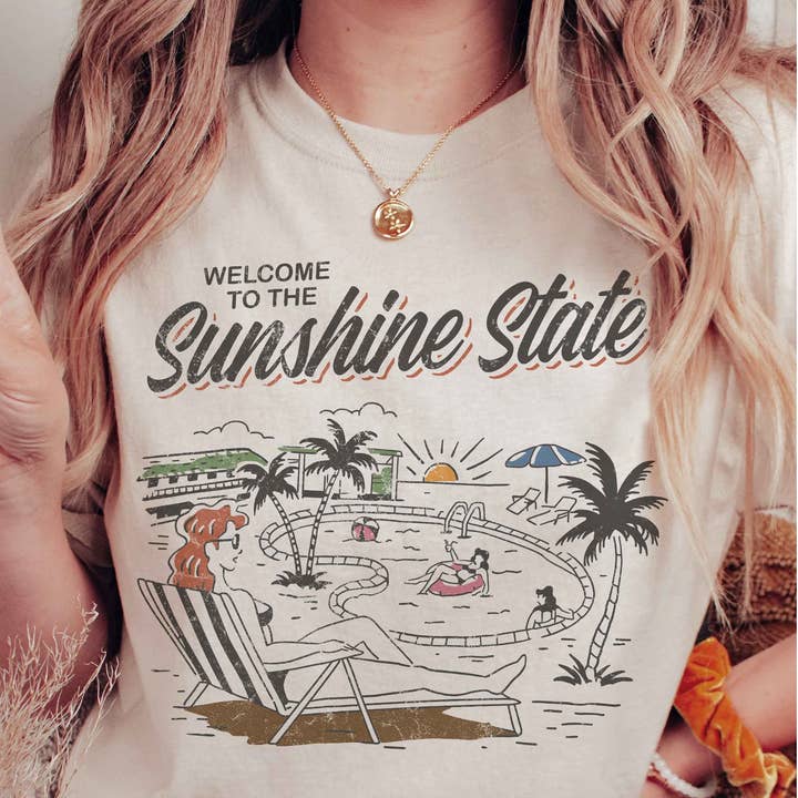 WELCOME TO THE SUNSHINE STATE Grafik-T-Shirt für den Großhandel von BLUME & CO.
