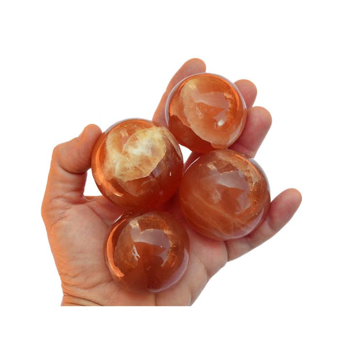 Esfera de Calcita Mel Natural (45 mm - 55 mm) por atacado de Kaia & Crystals