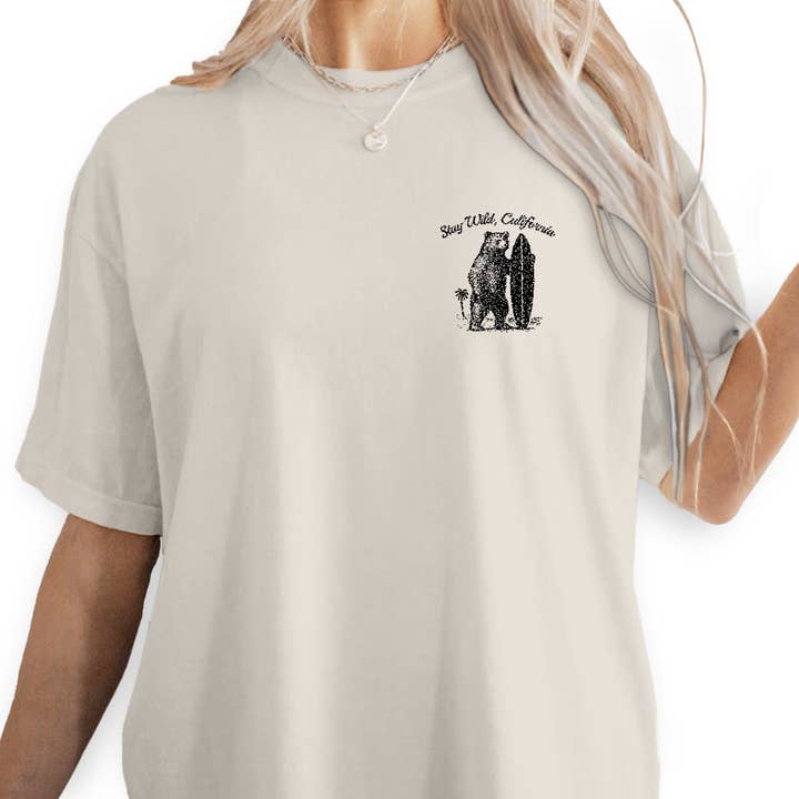 Textile Graphix - Wholesale Screen Printed T-Shirt - Women's - California Wild Surfer T-Shirt, Bear Surfing Tee, Stay Wild California Shirt, Vintage Coastal Adventure Graphic Tee2