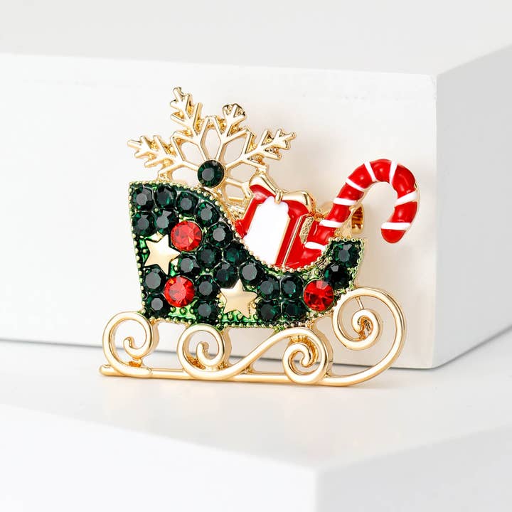 Green Christmas Sleigh Brooch With Snowflake, Candy Cane & Gift for wholesale on Faire2