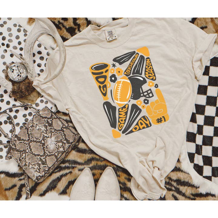 Black & Gold Hand Drawn Football Abstract Flower Art Ivory Tee for wholesale by The Red Rival Wholesale
