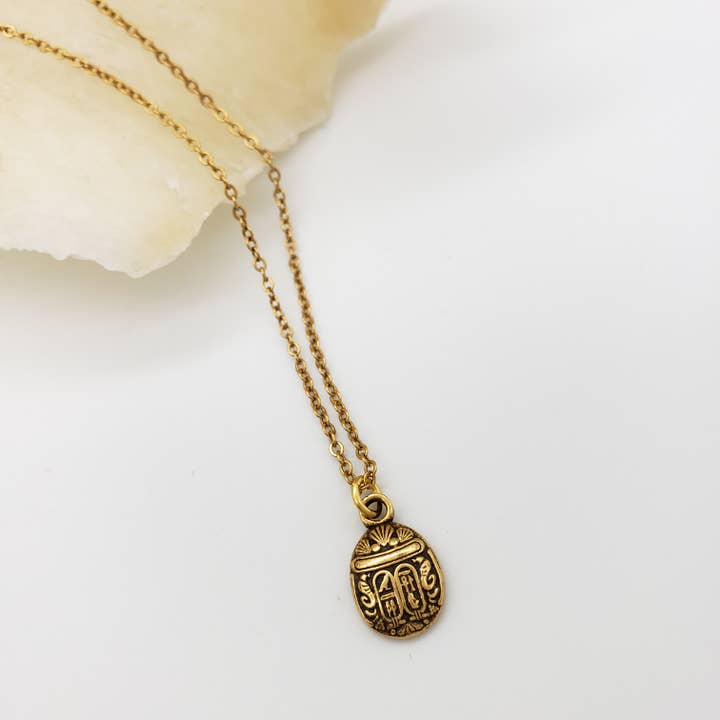 Discoveries, Inc. – wholesale Hänge-/berlockhalsband – Egyptisk skarabé-hänge - Mini, antikguld