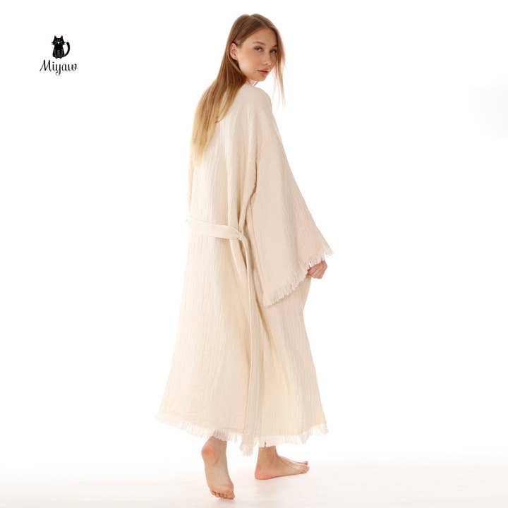 Beige Bohemisk kaftan i ren bomull med fransar och kimonomodell för wholesale på Faire4