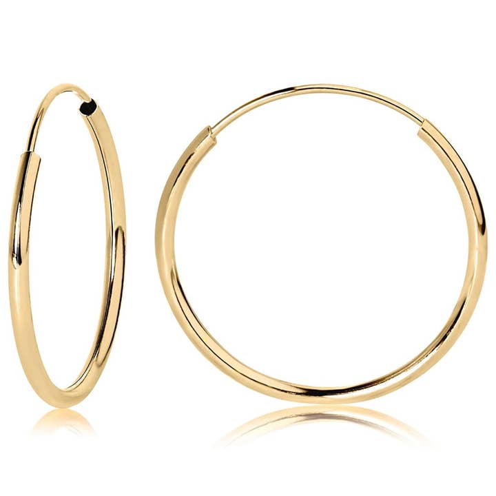14K Yellow Gold Endless Hoop Earrings - 2 Sizes and other Purchase Wholesale varsel. Free Returns & Net 60 Terms on Faire trending on Faire.