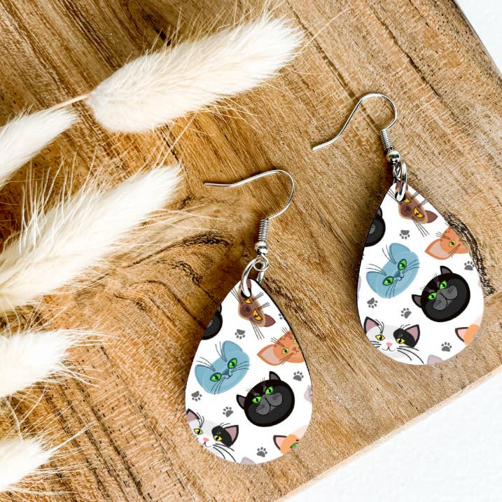 CAT FACES on white print dangle teardrop earrings for wholesale by Eartherella Soap & Candle Co., LLC