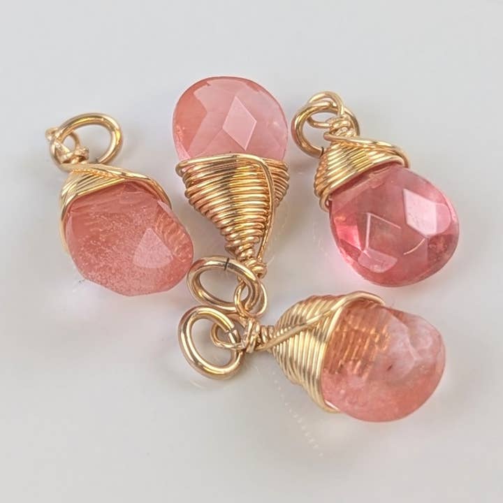 Compassion Strawberry Quartz Charms in Gold - Pack of 4 for wholesale by Forai