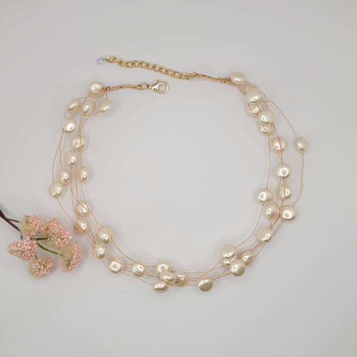 MULTI STRAND FAUX PEARL NECKLACE. for wholesale by BETTYOH INC