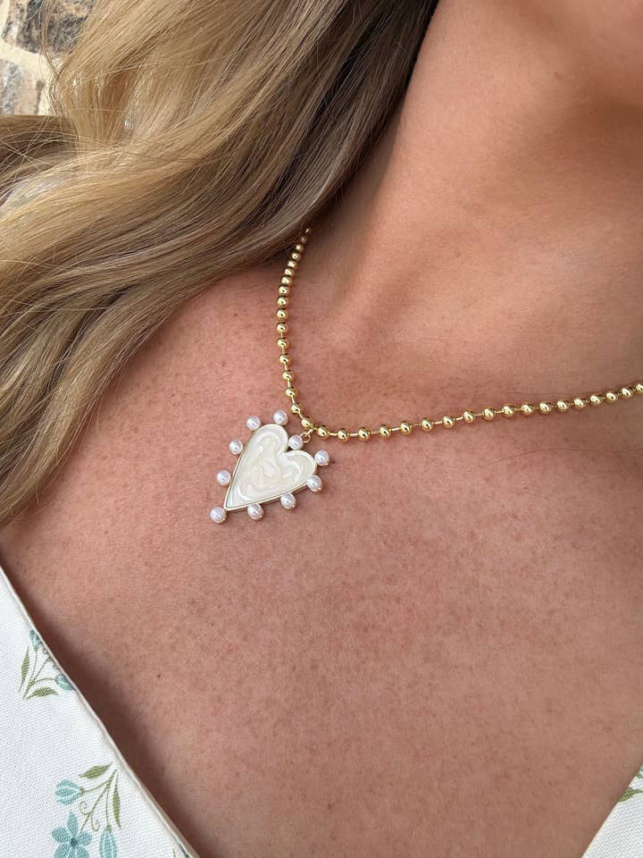 HEART NECKLACE WITH PEARLS ON THE OUTSIDE for wholesale by Triple Play Jewelry