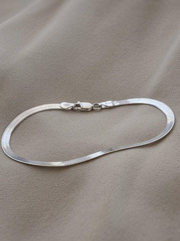Slinky Silver Herringbone Chain Bracelet for wholesale by Dea Dia