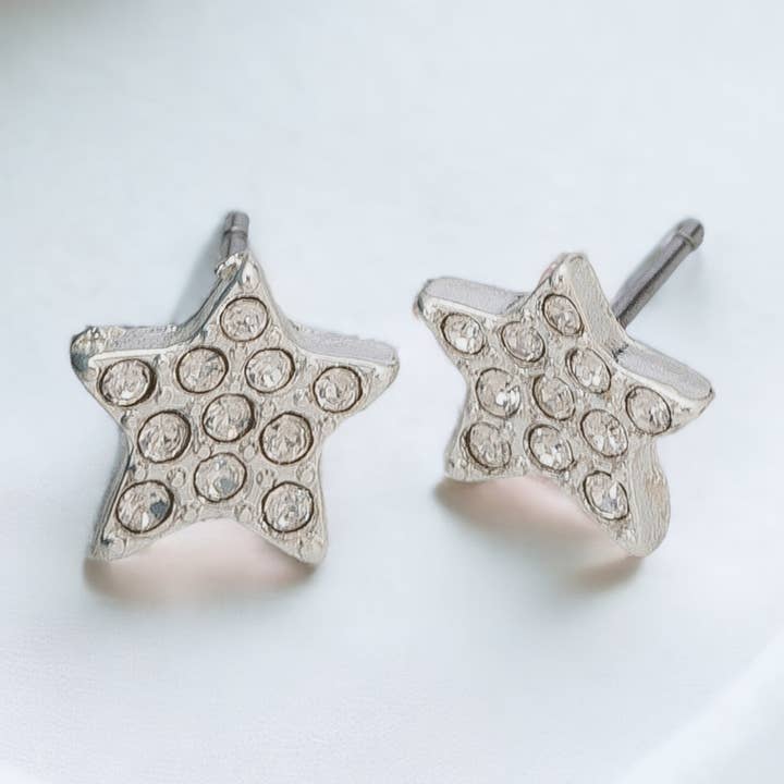 Orecchini a perno a forma di stella con pavé d'argento per la vendita all'ingrosso da parte di Howard's