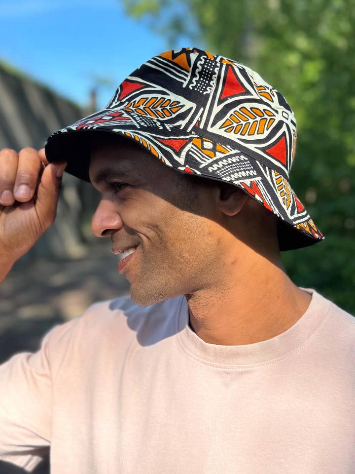 Bucket hat / Fisherman hat with African print - Red & Orange Bogolan Symbols - Kids & Adults sizes (Unisex) for wholesale by AfricanFabs