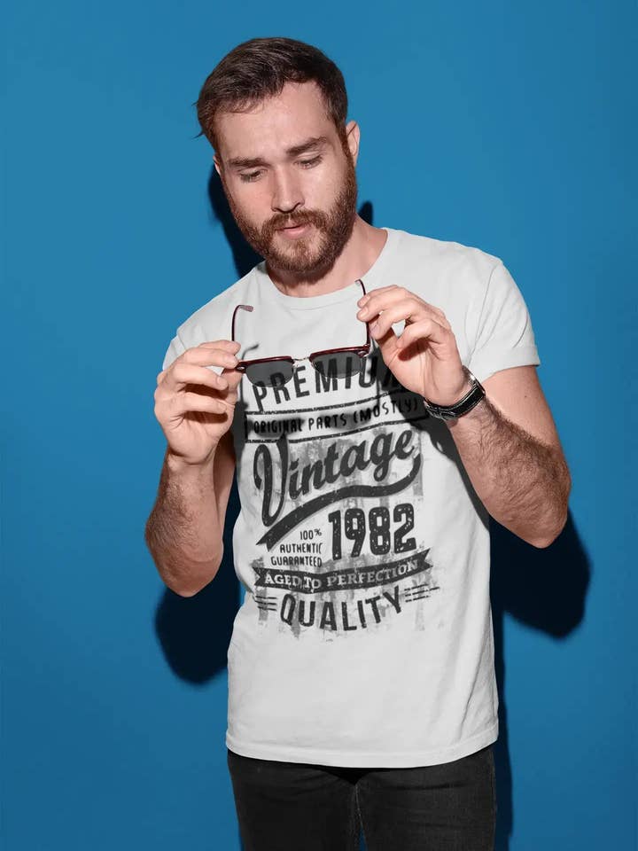 ULTRABASIC - T-shirt regalo di compleanno da uomo con grafica del 1982 Aged to Perfection per la vendita all'ingrosso da parte di ULTRABASIC