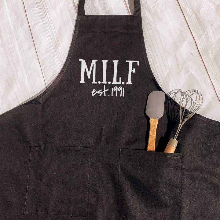 Milf Apron With Year, Gift For Mom, Mothers Day Gift for wholesale by Dirty Grove by Hazel Grove Customs