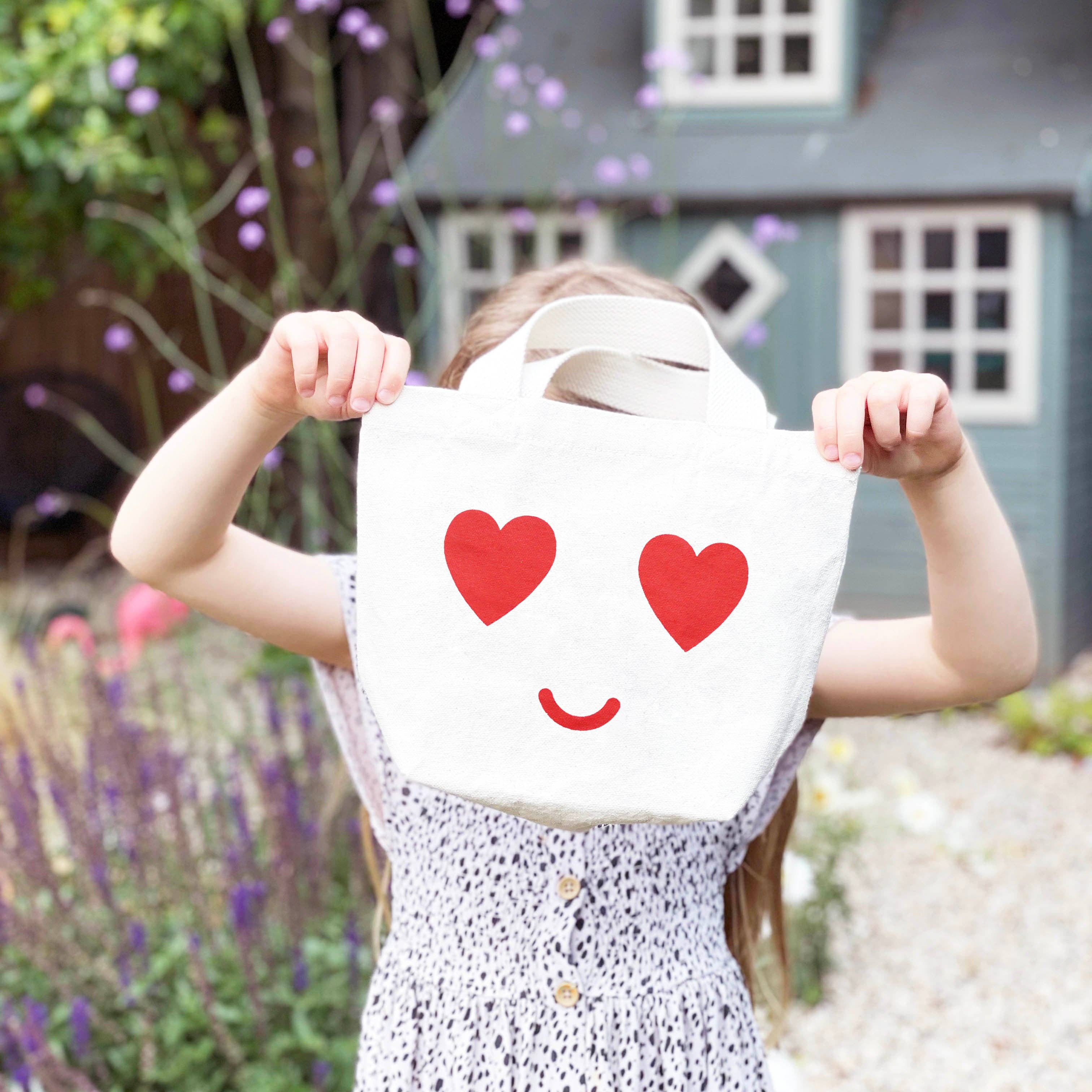 Alphabet Bags - Venta al por mayor Bolsa de asa - Niños - Bolsa pequeña de lienzo con carita de ojos en forma de corazón1