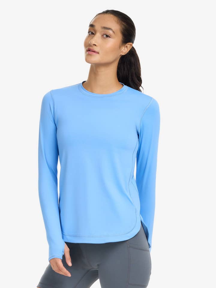 HAUT DÉTENDU À COQUILLES POUR FEMMES (2015) pour la vente par BloqUV