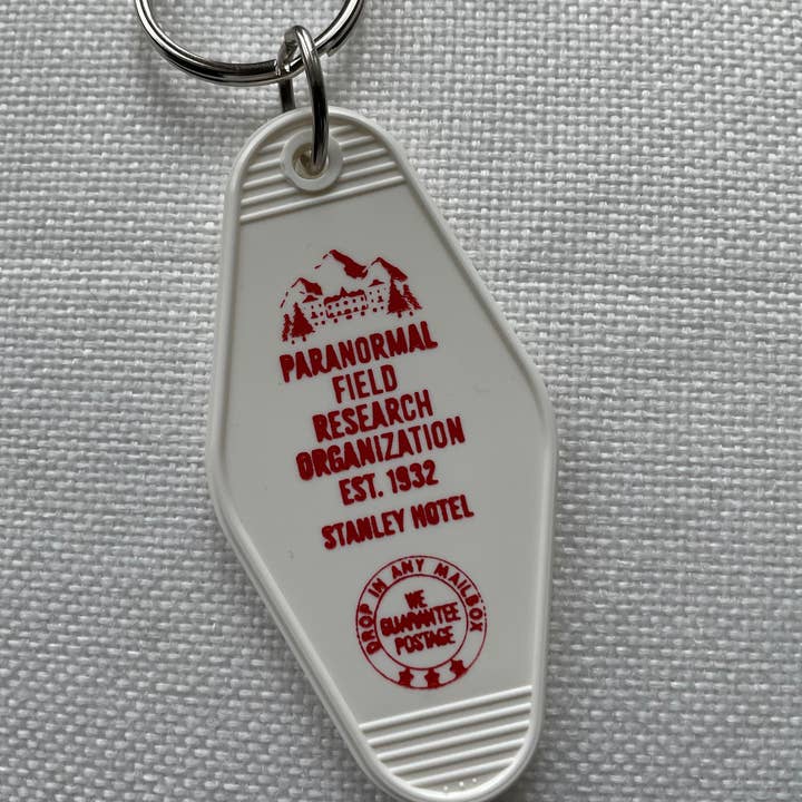 Motel Key Fob - Paranormal Research Org.- Stanley Hotel for wholesale by The 3 Sisters Design Co.