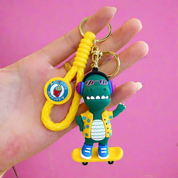KiddieKickz - Wholesale Keychain – Child - Cartoon DJ Little Dinosaur Doll PVC Keychain Cute Keychain