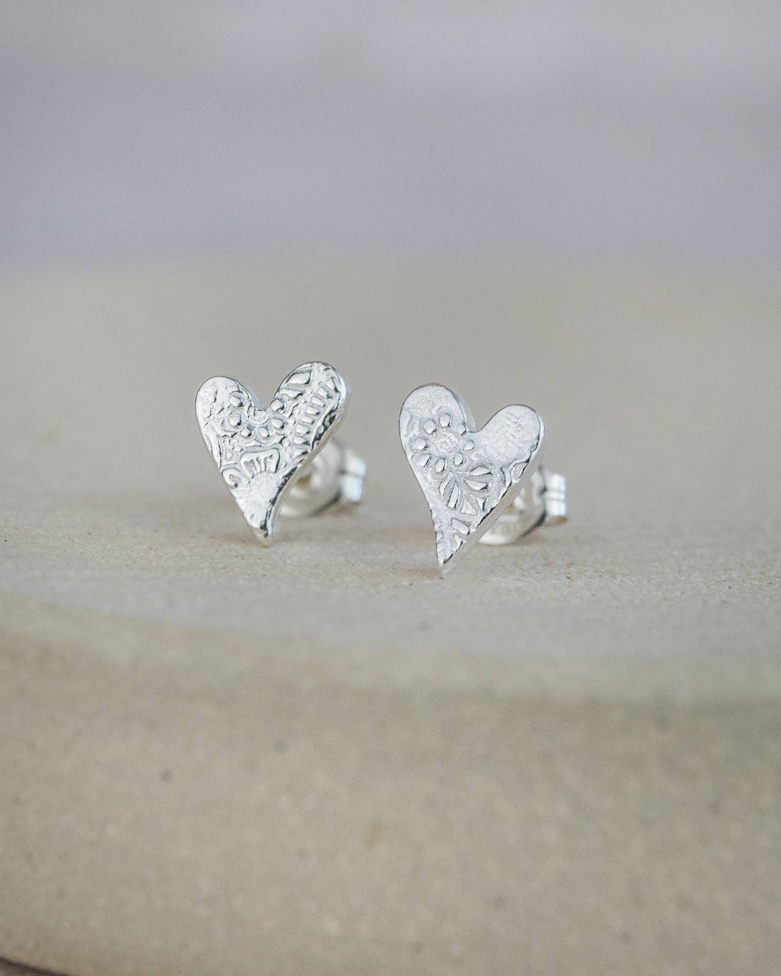 Lucy Kemp Jewellery - Wholesale Stud/Post Earrings - Sterling Silver Textured Tilted Heart Studs