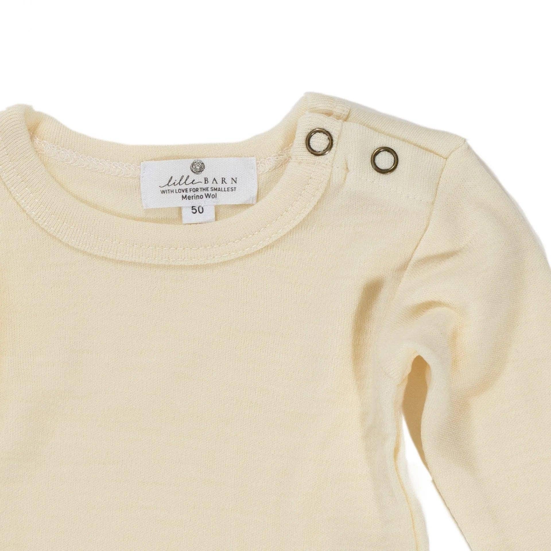 Lille Barn – wholesale Overall - Baby – Långärmad romper i merinoull – naturlig3