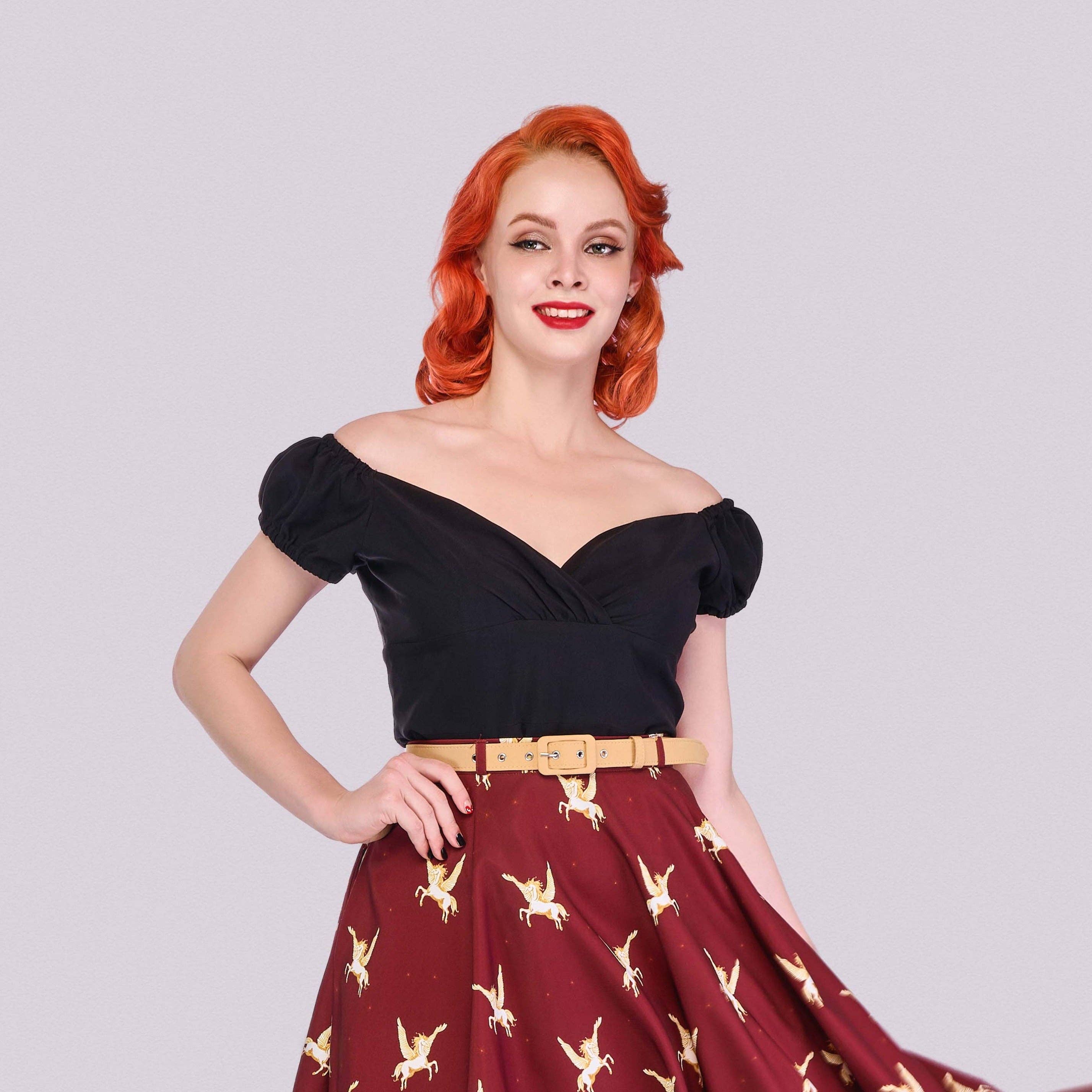 NOIR Blouse Rita avec encolure cœur classique et manches bouffantes en vente sur Faire0