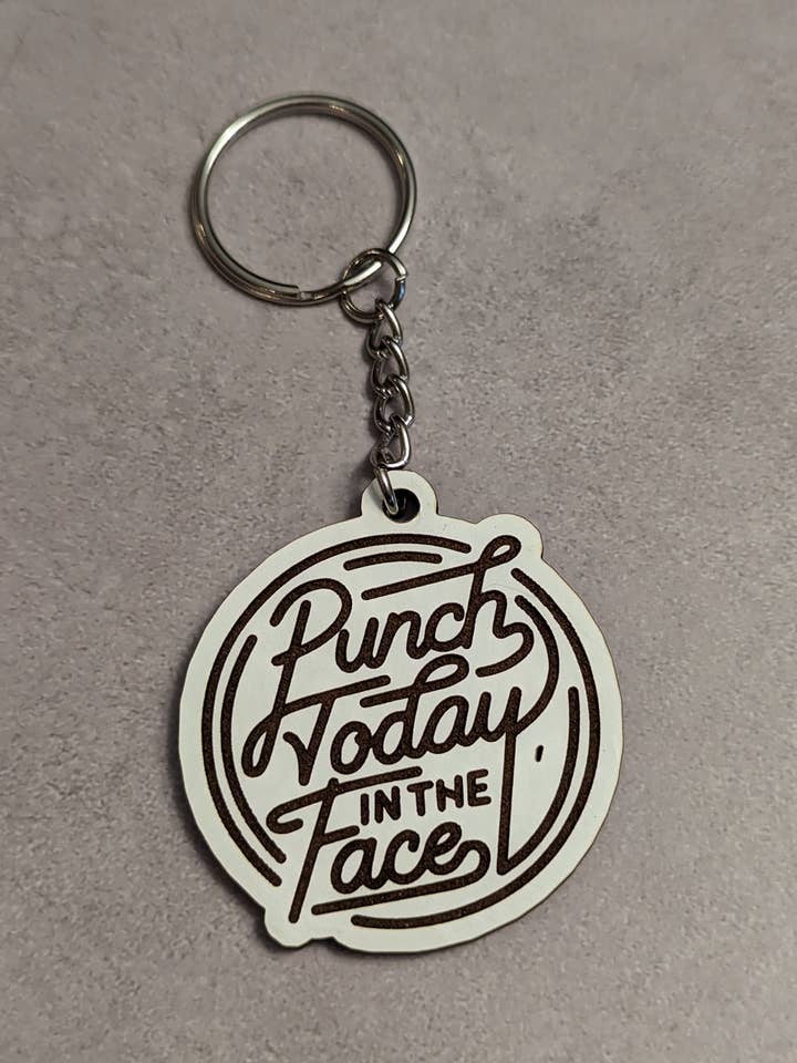 Llavero novedoso Punch Today In The Face para venta al por mayor de Bean Hut Boutique