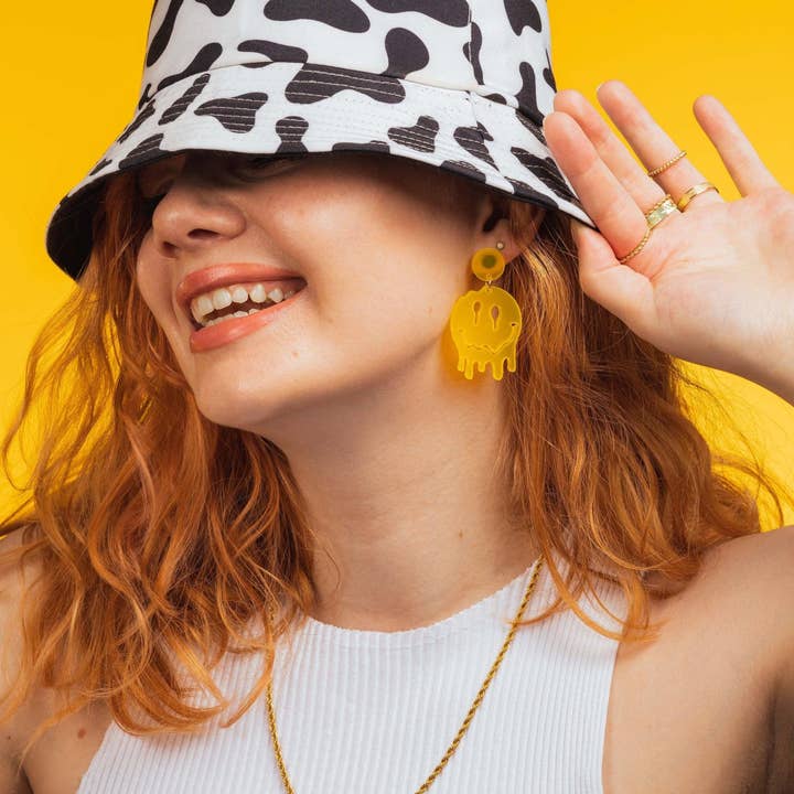 Melted Smiley Face Dangle Earrings for wholesale by Sleepy Mountain