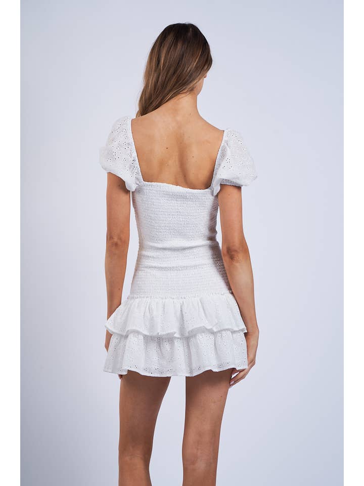 -WHITE EYELET PUFF SLEEVE RUFFLE LAYERED MINI DRESS for wholesale on Faire