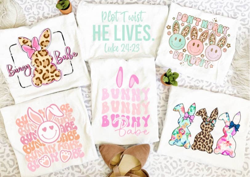 Simply Blush Wholesale - Wholesale Screen Printed T-Shirt - Women's - Plot Twist, He Lives Tee/Sweatshirt1