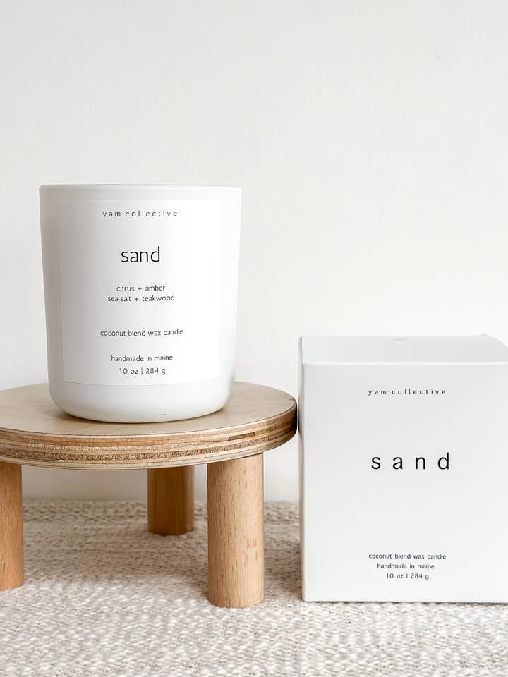 Sand - 10 oz Amber + Teakwood Matte White Glass Candle for wholesale by yam collective