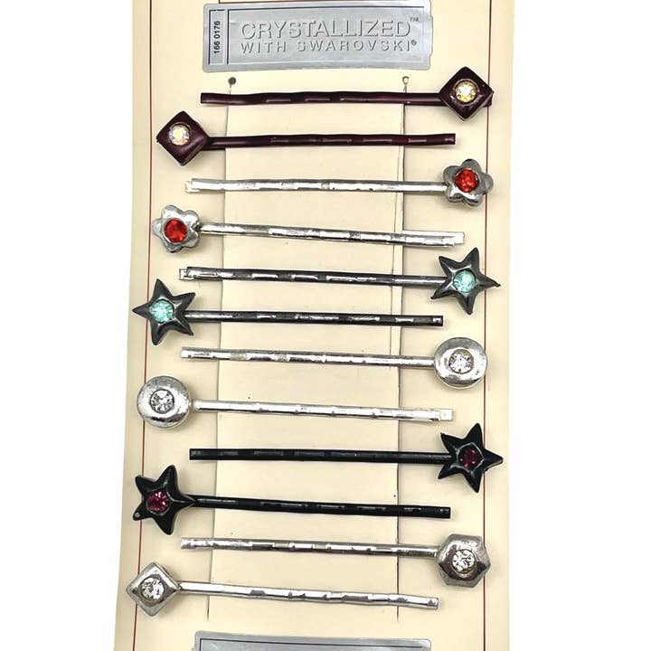 Förpackning med 12 hårspännen med SW-kristaller. Geometriska figurer i färger för wholesale av Gloria Mago