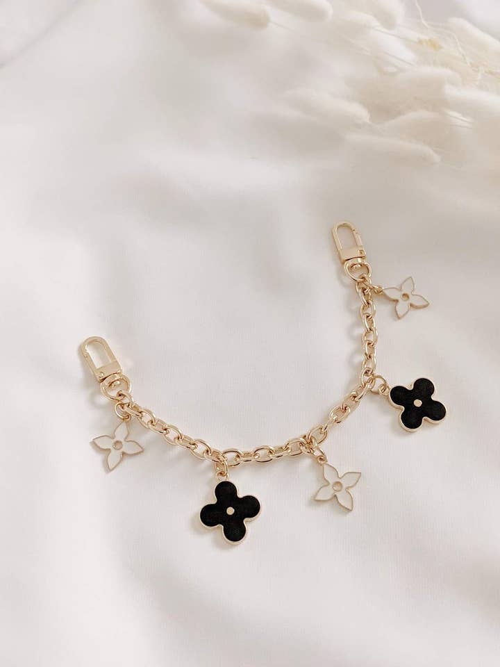 Tinsley Fleur Noir kæde charme for engroshandel hos Ziaziari