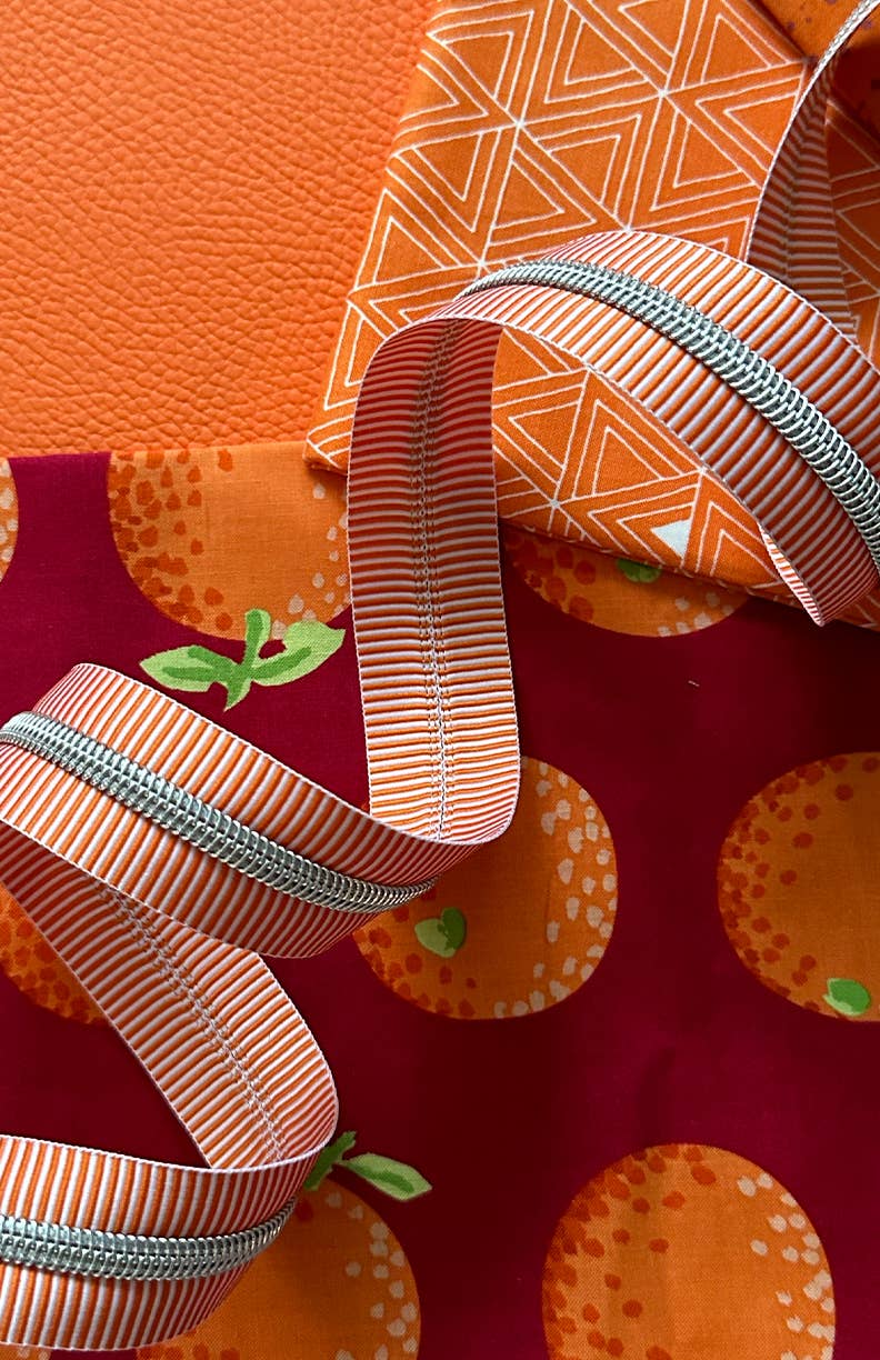 Sassafras Lane Designs - Vendita all'ingrosso Attrezzature per lavoretti e fai da te - Nastro con cerniera a strisce arancioni con denti in nichel3