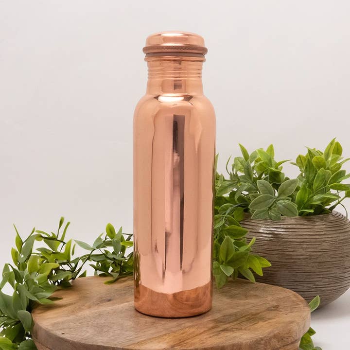 Pure copper water bottle smoothly polished ± 750 ml/290 g. for wholesale by Ayurveda Specialist B.V.