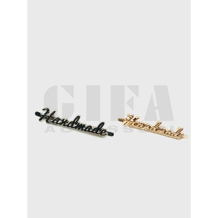 Gifa Accessori - Vendita all'ingrosso Spille - Targhetta doppia Handmade in zama con alette
