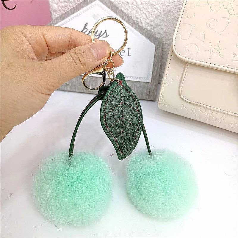 FurDecoration - Vendita all'ingrosso Portachiavi - Donna - Portachiavi soffice a pompon con pelo di coniglio Rex a forma di ciliegia1