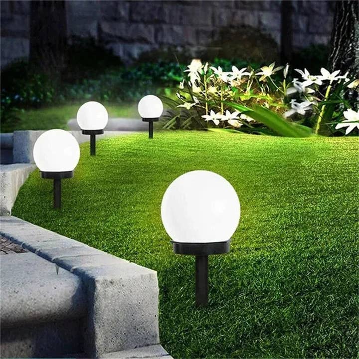 Solar Lawn Lights 4-Piece Set for wholesale by Kiyo Home