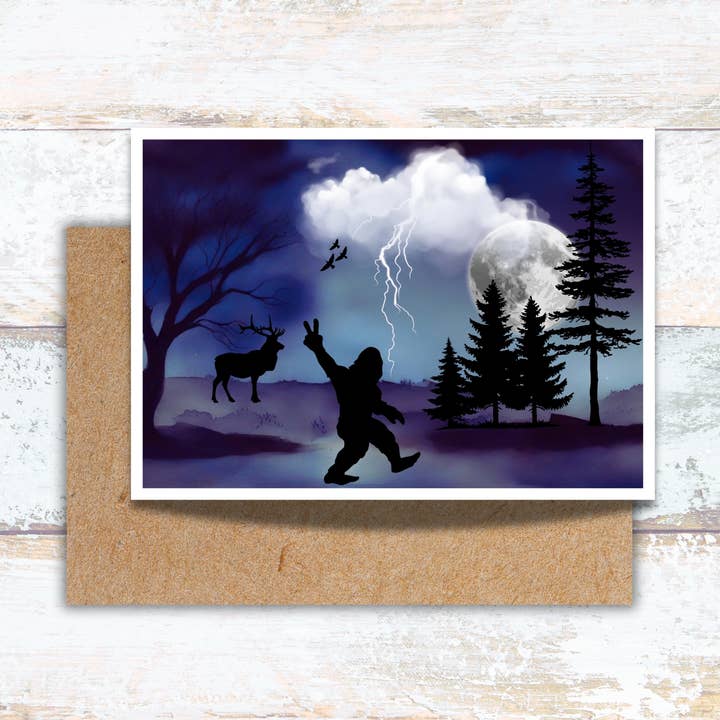 Bigfoot Giving the Peace Sign to an Elk Watercolor Card for wholesale by Designs by Michaela