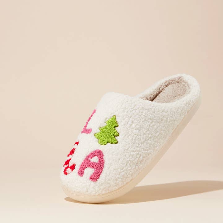 Pink ‘FALALALA’ Tree Fuzzy Home Slippers for wholesale on Faire