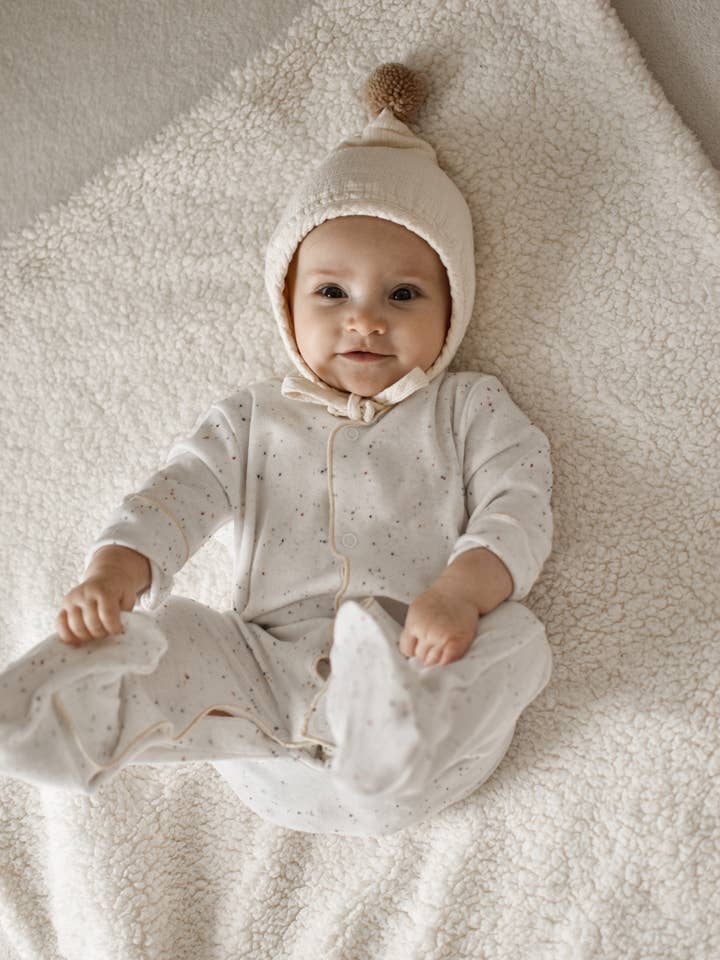 CAJA - Ekologisk babyoverall i mjölkvitt för wholesale av North Baby