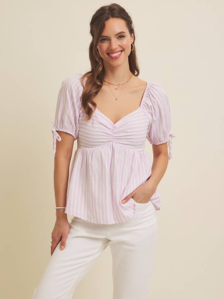 MADE FOR SUNSHINE, TEXTURED STRIPE BABYDOLL TOP WITH BOWS for wholesale by in february