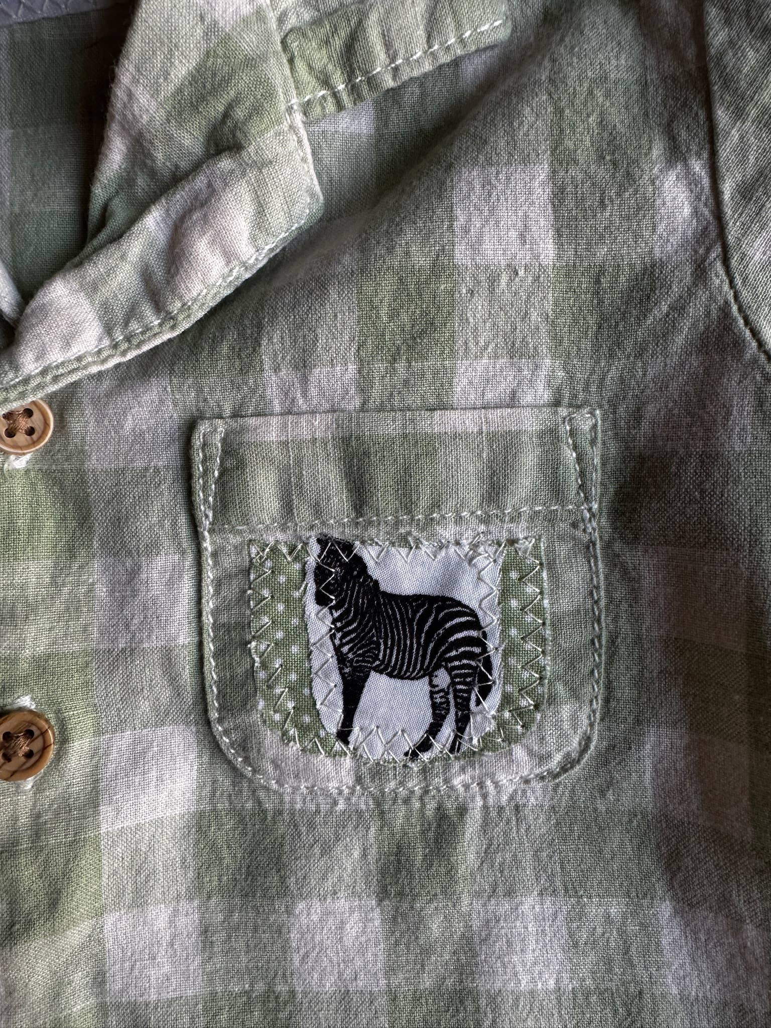 Hammy Downs Threads - Vente Ensemble haut et short – enfant - Ensemble de points et carrés zébrés
Taille-12M Uniquement 1 disponible. Pièce unique5