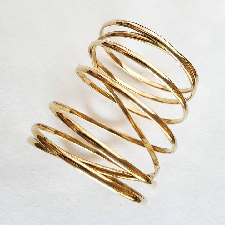 Bracelet jonc extensible en laiton Infinity pour la vente par Bisjoux