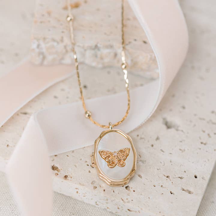 Butterfly Locket Necklace for wholesale by Eby Ruth
